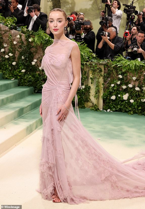 NEW YORK, NEW YORK - MAY 06: Phoebe Dynevor attends The 2024 Met Gala Celebrating "Sleeping Beauties: Reawakening Fashion" at The Metropolitan Museum of Art on May 06, 2024 in New York City. (Photo by John Shearer/WireImage)