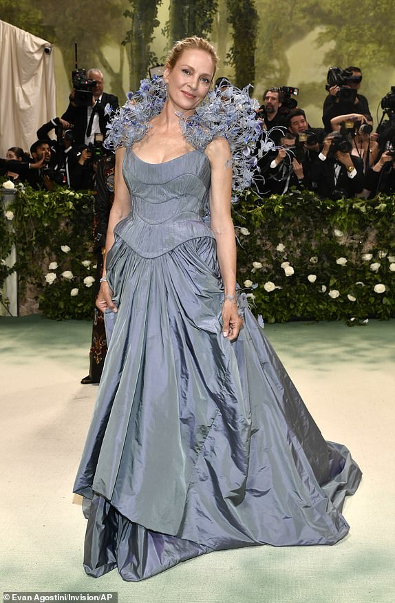 Uma Thurman attends The Metropolitan Museum of Art's Costume Institute benefit gala celebrating the opening of the "Sleeping Beauties: Reawakening Fashion" exhibition on Monday, May 6, 2024, in New York. (Photo by Evan Agostini/Invision/AP)