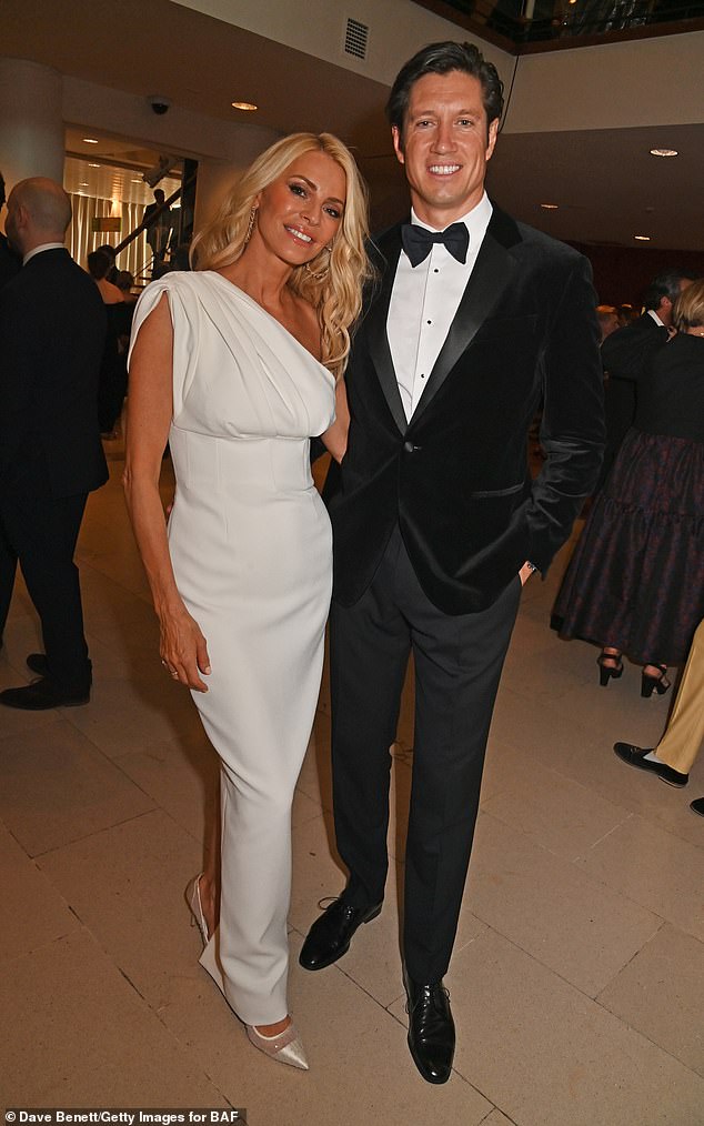 The presenter, 55, looked stunning in the sophisticated number as she posed up a storm at the star-studded event held at the Royal Festival Hall in London