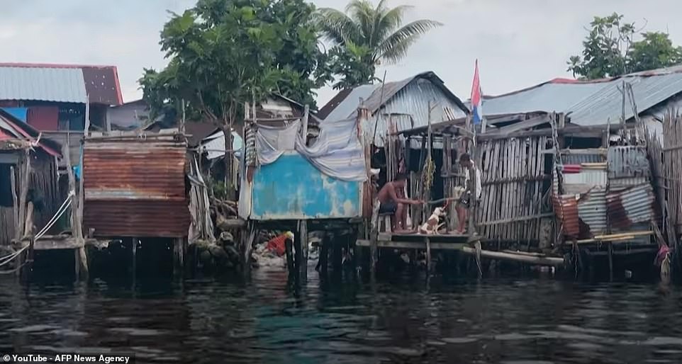 The tiny outcrop, which measures some 1,300 feet by 500 feet, is home to around 2,000 people and in one scene the camera pans to show how many houses are built on stilts due to constant flooding