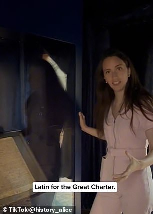 Alice is pictured above in Salisbury Cathedral, standing next to the Magna Carta