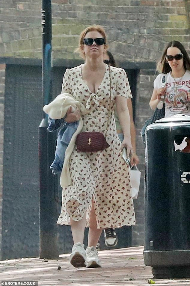 Newly-single Isla pictured on a stroll in Hampstead without her wedding ring on Monday