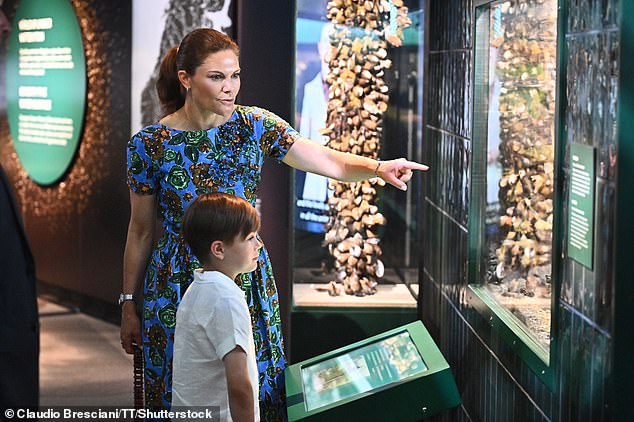 Crown Princess Victoria of Sweden was every inch the doting mother and she and her son Oscar enjoyed a visit to a science museum