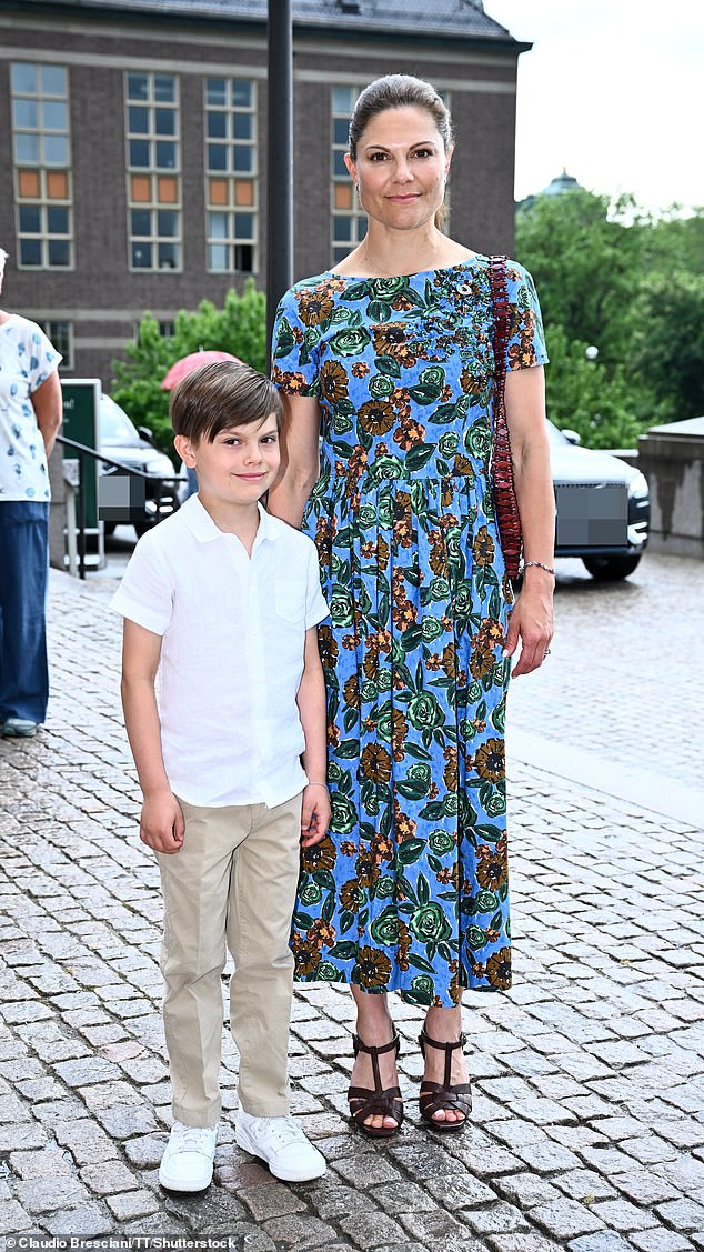 The royal, 46, grinned as she huddled by her eight-year-old as the pair inaugurated the World of Water exhibit at the Swedish Museum of Natural History on Monday