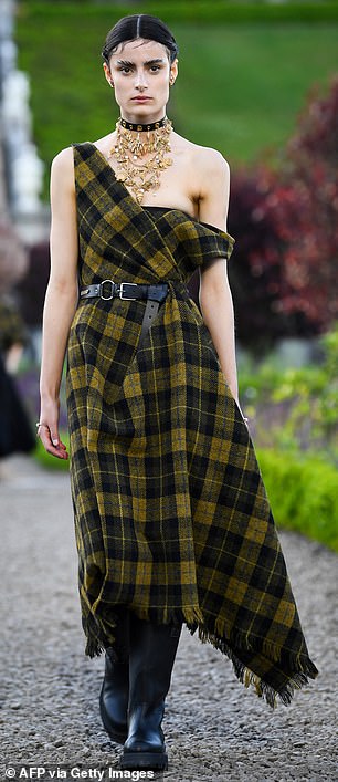 One model donned a tartan dress which was belted