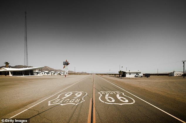 Old Route 66 is pictured with Roy's in the background on the left hand side of the historic road