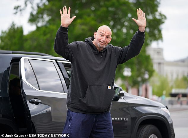 Pennsylvania Sen. John Fetterman exits a Chevy Traverse at the U.S. Capitol