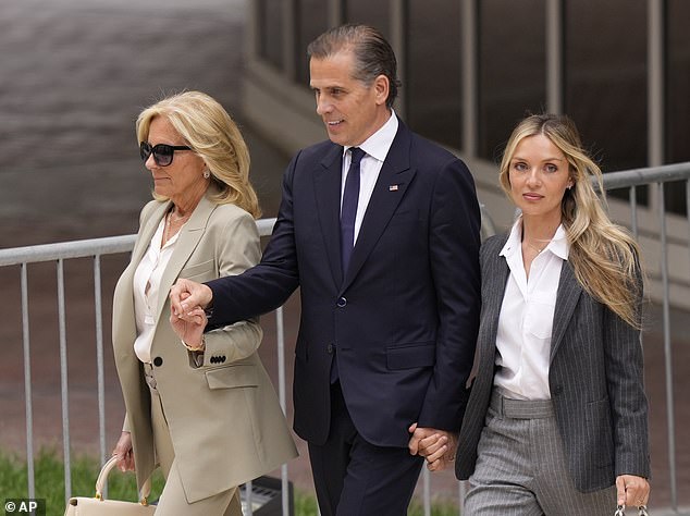 First lady Jill Biden (left) holds hands with her stepson Hunter Biden (center) with wife Melissa Cohen (right) as they depart the courthouse in Wilmington Tuesday, after receiving the guilty verdict