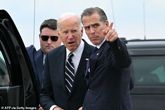 US President Joe Biden talks with his son Hunter Biden at Delaware Air National Guard Base in New Castle, Delaware, on June 11, 2024 after Hunter's gun trial conviction