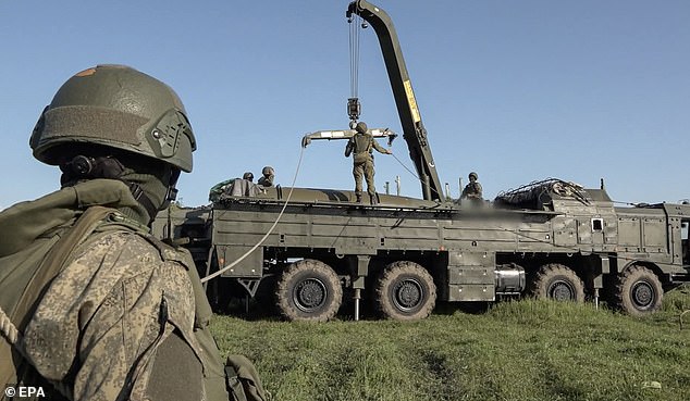 Russian servicemen operating a non-strategic nuclear missile for Iskander operational-tactical missile system