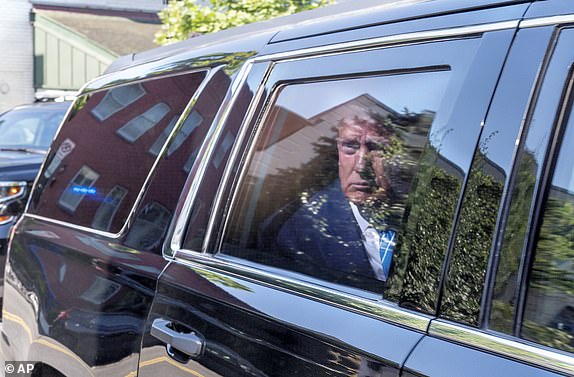 Former President Donald Trump arrives to the Capitol Hill Club, Thursday, June 13, 2024, in Washington. (AP Photo/Jacquelyn Martin)