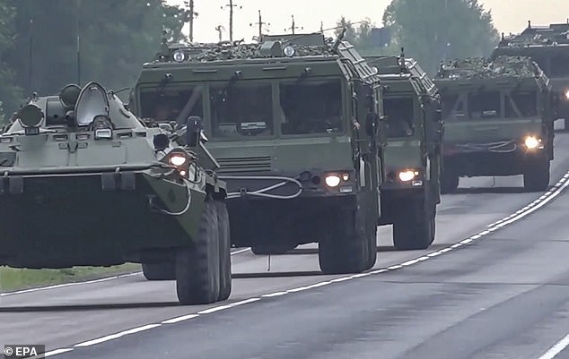 Russian heavy armour and missile launchers are seen deploying to firing positions