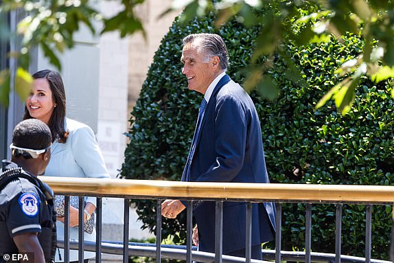 epa11408258 Republican Senators from Utah, Mitt Romney (R) and from Alabama Katie Britt (L) arrive for former US president Donald J. Trump's meeting with Senate lawmakers at the National Republican Senatorial Committee on Capitol Hill in Washington, DC, USA, 13 June 2024. It is the first time Trump has returned to Capitol Hill since mobs of his supporters attacked the Capitol building on 06 January 2021. Trump now refers to the insurrectionists as 'J6 warriors' and 'victims.'  EPA/JIM LO SCALZO