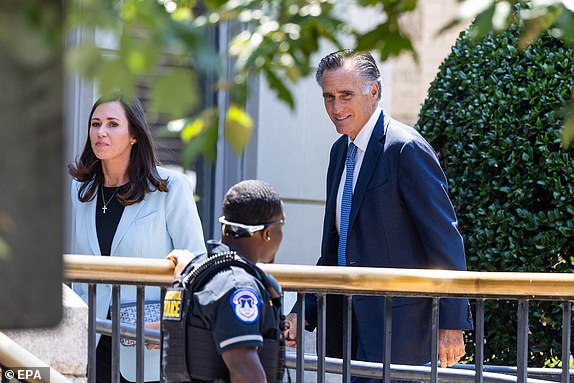 epa11408260 Republican Senators from Utah, Mitt Romney (R) and from Alabama Katie Britt (L) arrive for former US president Donald J. Trump's meeting with Senate lawmakers at the National Republican Senatorial Committee on Capitol Hill in Washington, DC, USA, 13 June 2024. It is the first time Trump has returned to Capitol Hill since mobs of his supporters attacked the Capitol building on 06 January 2021. Trump now refers to the insurrectionists as 'J6 warriors' and 'victims.'  EPA/JIM LO SCALZO