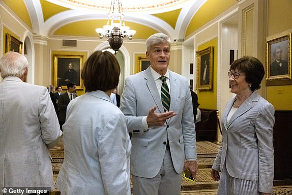 WASHINGTON, DC - JUNE 13: Sens. Bill Cassidy (R-LA), Susan Collins (R-ME), and Amy Klobuchar (D-MN) gather for the recognition of National Seersucker Day on Capitol Hill on June 13, 2024 in Washington, DC. Members of Congress wear seersucker clothing on Seersucker Thursday, an annual tradition that was initiated by former Senate Majority Leader Sen. Trent Lott (R-MS) in 1996, to mark the National Seersucker Day.  Members of Congress wear seersucker clothing on Seersucker Thursday, an annual tradition that was initiated by former Senate Majority Leader Sen. Trent Lott (R-MS) in 1996, to mark the National Seersucker Day.  (Photo by Anna Rose Layden/Getty Images)