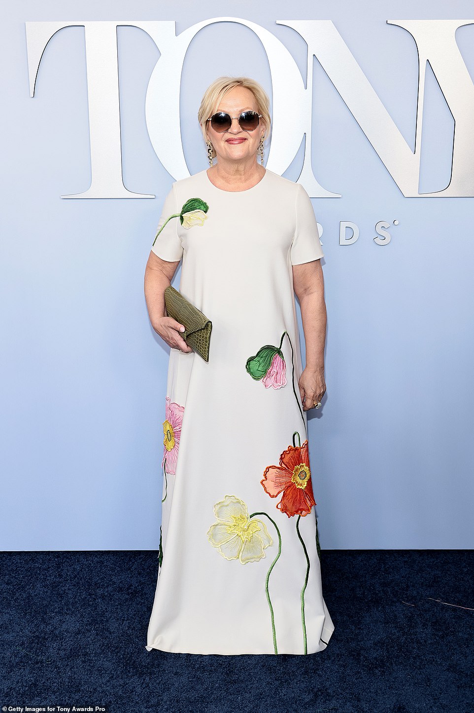 Maria Friedman chose a floral embroidered gown; featuring yellow, orange and pink flowers