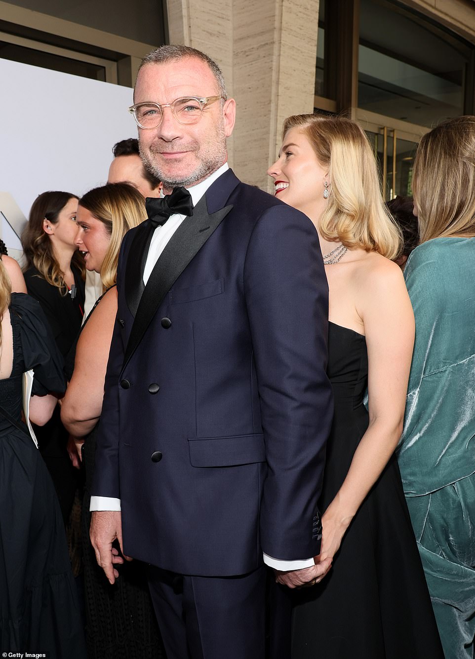 The couple held hands as they made their way on the red carpet