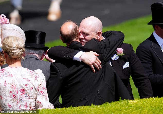 Mike pictured hugging Prince Edward, the Duke of Edinburgh, during day two of Royal Ascot on Wednesday