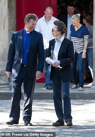 Princess Anne leaves the rehearsal with Reverend Neil Gardner