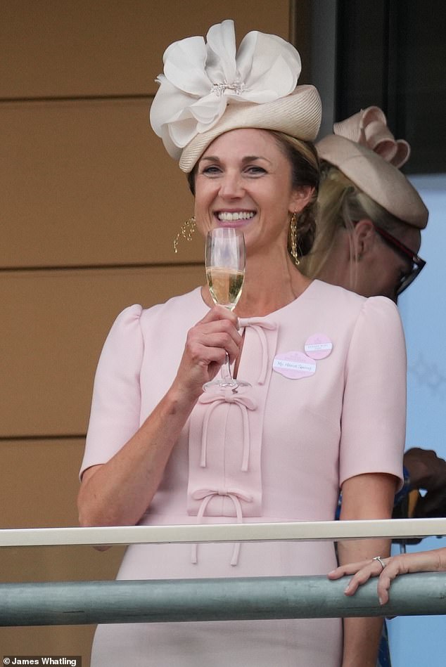 Elsewhere, Harriet was elegant in a pastel pink dress with bow detailing along the front, accessorised with a matching headpiece