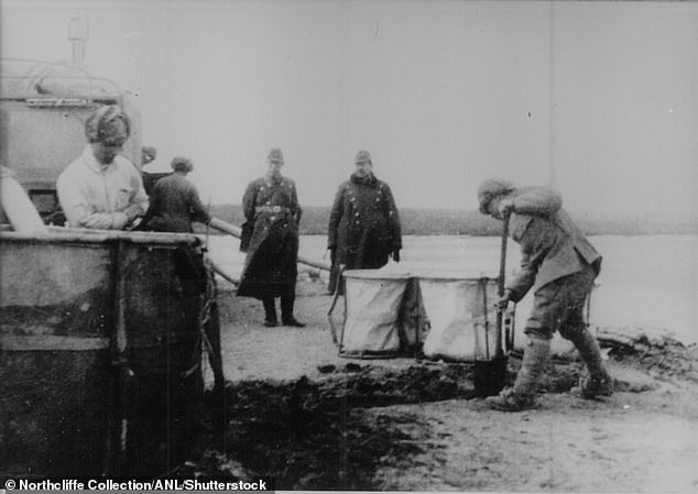 Shimizu was called to bury the burnt bones of murdered inmates in an effort to conceal the unit's crimes. Pictured: Digging at Unit 731