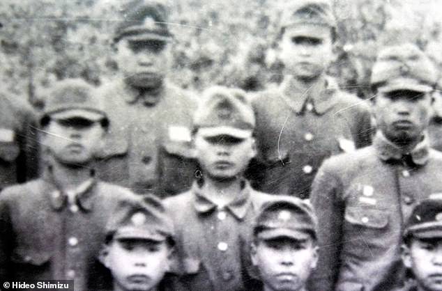 Hideo Shimizu, center, in 1945 when he was a teenage cadet who had just been recruited to Unit 731