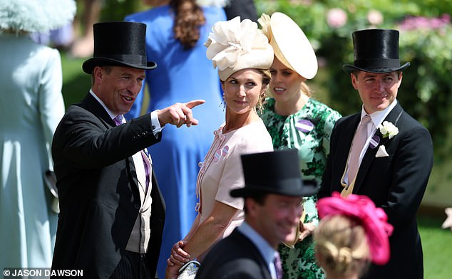 Peter was in high spirits as he grinned and chatted with Harriet, alongside other guests at the event