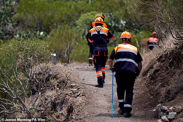 Emergency workers near the village of Masca, Tenerife, search for missing teenager Jay Slater