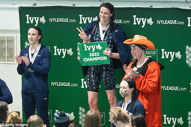 Thomas smiles after winning the 500 freestyle at the 2022 Ivy League championships