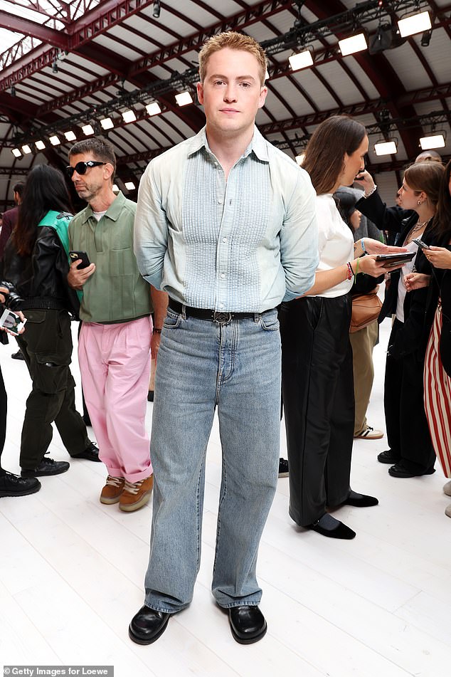 Elsewhere, Kit Connor, 20, chose a more relaxed look for the event, wearing a striped linen skirt with a pair of light blue jeans