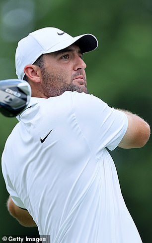 Scheffler is at -13 under after rolling in his birdie on the par-3 fifth hole in Cromwell, Connecticut, Sat.