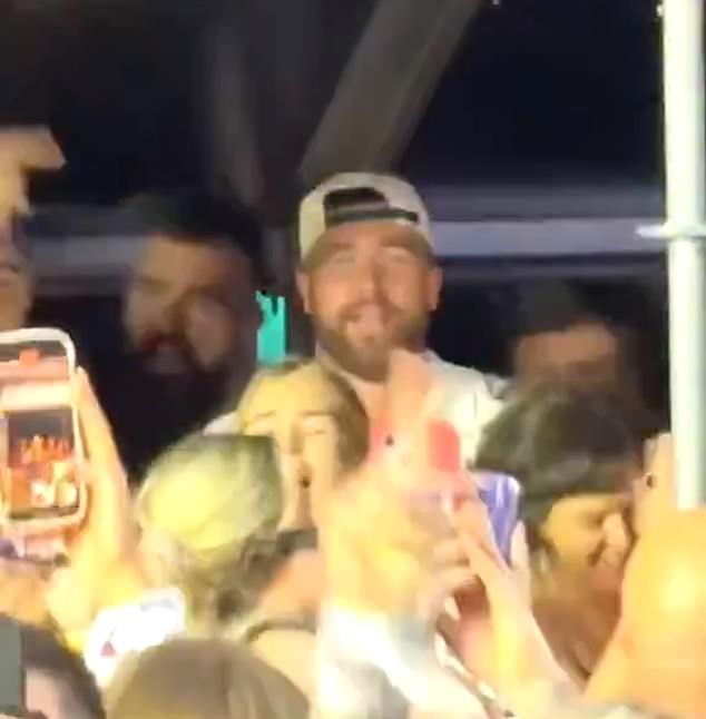 Jason Kelce (top left) was seen going crazy next to brother Travis at Taylor Swift's concert