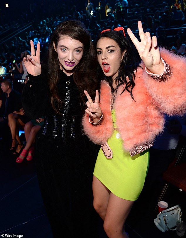 The shock collaboration follows rumours that the original track on Brat, was about Lorde, 27, with Charli singing about an 'awkward' and confusing relationship she has with another female singer who she 'doesn't have much in common' with (pictured together in 2014)