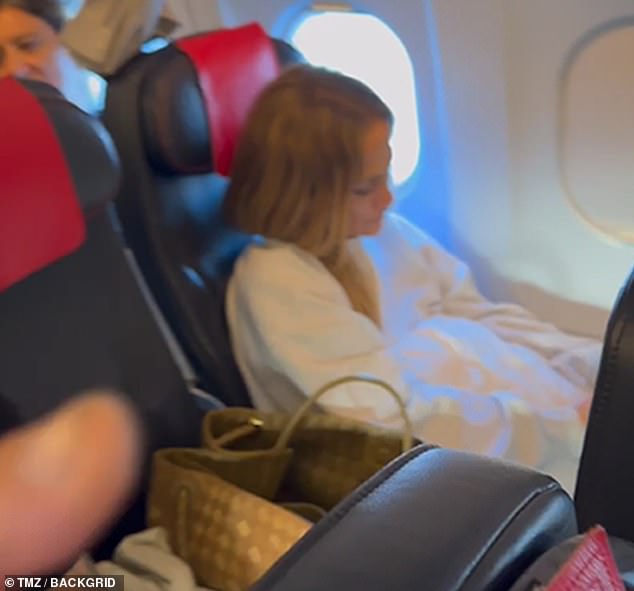 Jennifer Lopez did her best not to draw any attention to herself as she was spotted flying in economy over the weekend on a KLM flight from Naples, Italy to Paris, France