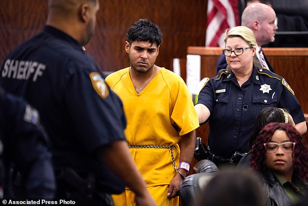 Johan Jose Martinez-Rangel, one of the two men accused of killing 12-year-old Jocelyn Nungaray, is led from the courtroom by deputies on Tuesday, June 25, 2024 in Houston.