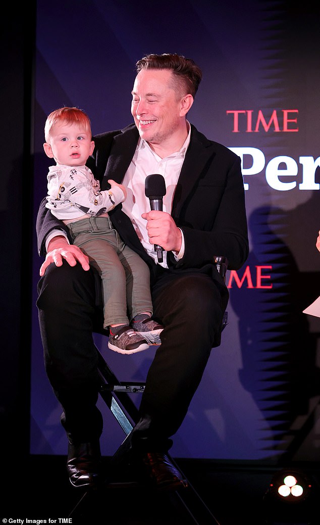 Elon and X are pictured in December 2021. Grimes said that her son 'out there' because Elon has been 'bringing him to everything,' however she doesn't want her daughter to have the same attention