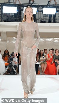 Another model showcased a sheer silver dress