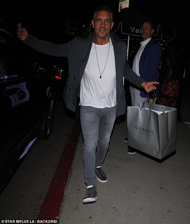 The Agency founder was photographed leaving his party carrying a large bag from luxury retailer Geary's of Beverly Hills