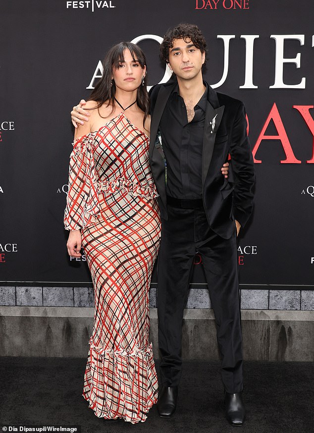 Alex was joined by his girlfriend of four years, singer-songwriter Rozzi Crane, wearing a plaid cold-shoulder dress