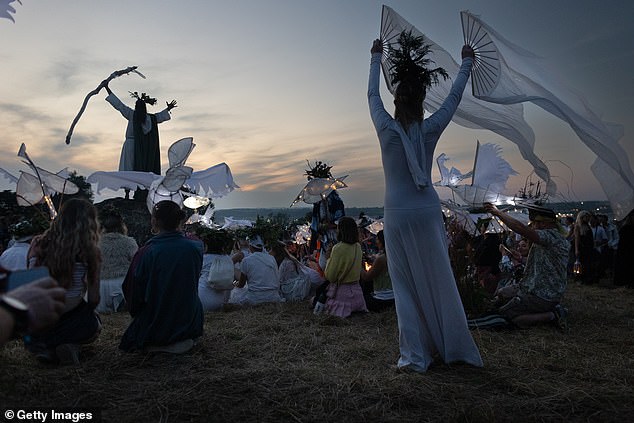 Performers take part in peace parade as part of the opening ceremony held at the Stone Circle yesterday