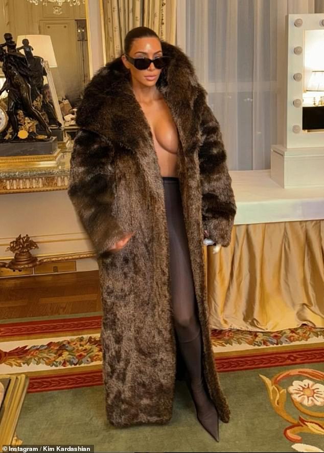 Katy's fur coat also harked back to Kim herself - who exuded glamour in a black faux-fur coat in France in March