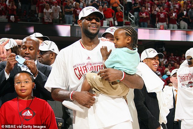 LeBron James appears holding young Bronny after reaching his first NBA Finals in 2007