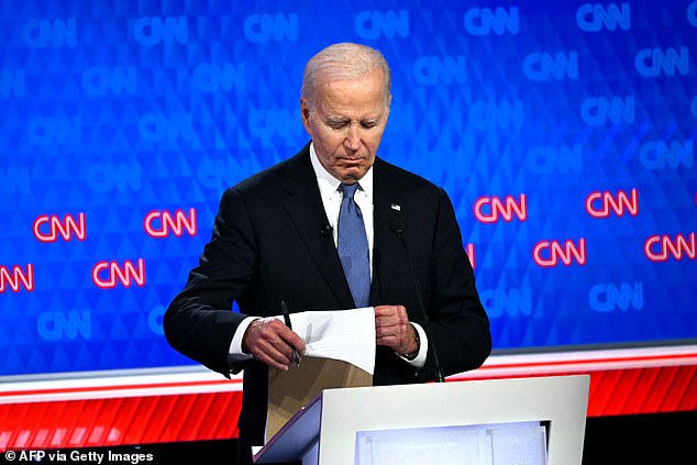 President Joe Biden looks at his notes during the first 2024 presidential debate