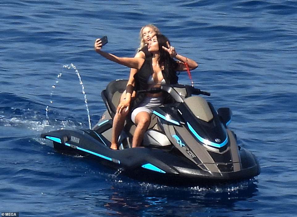 Kim Kardashian, who was joined by TV personality Olivia Pierson on a separate jet ski, also looked at ease on the water