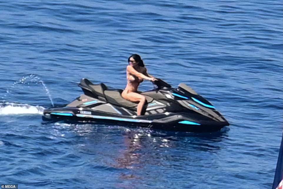 Lauren looked completely at ease as she effortless rode through the waves as she continues her sun-soaked holiday in Greece