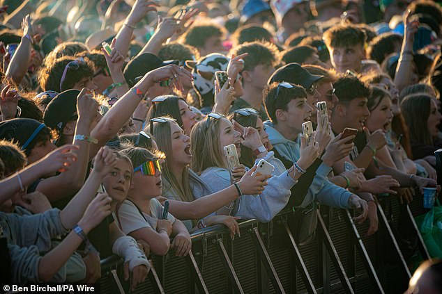 Crowds watch D-Block Europe perform on the other stage at Glastonbury Festival