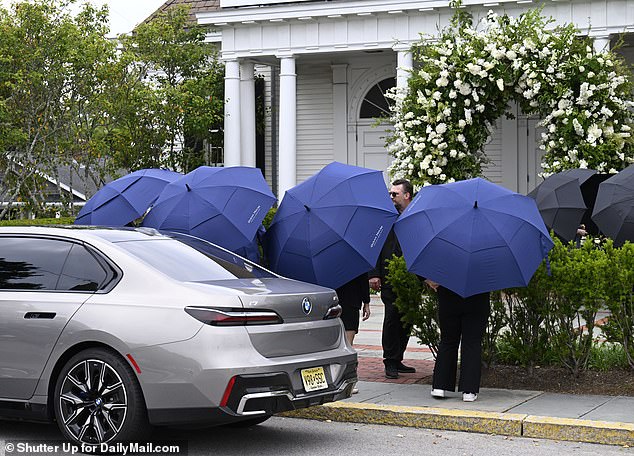 By 2 pm Saturday the rehearsals were in full swing - with chapel staff practicing a synchronized movement across the street with a flotilla of umbrellas which they'll use to shield the bride from public view during her grand entrance later