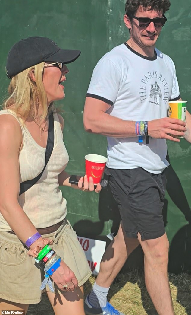 The outing came just two days before the art dealer, 32, reunited with Ellie, 37, to party with pals at Glastonbury (pictured)