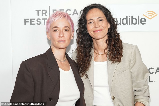 Rapinoe poses for a photo alongside fiancee Bird at a Tribeca Film Festival premiere this month