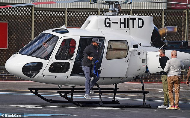 The Mission Impossible actor was spotted arriving to a heliport in the center of the bustling city with his son also tagging along